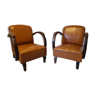 Paire de fauteuils studio simili cuir marron années 30