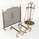 Antique bronze fire screen and fireplace accessories set. Game of seven. France, 1930s
