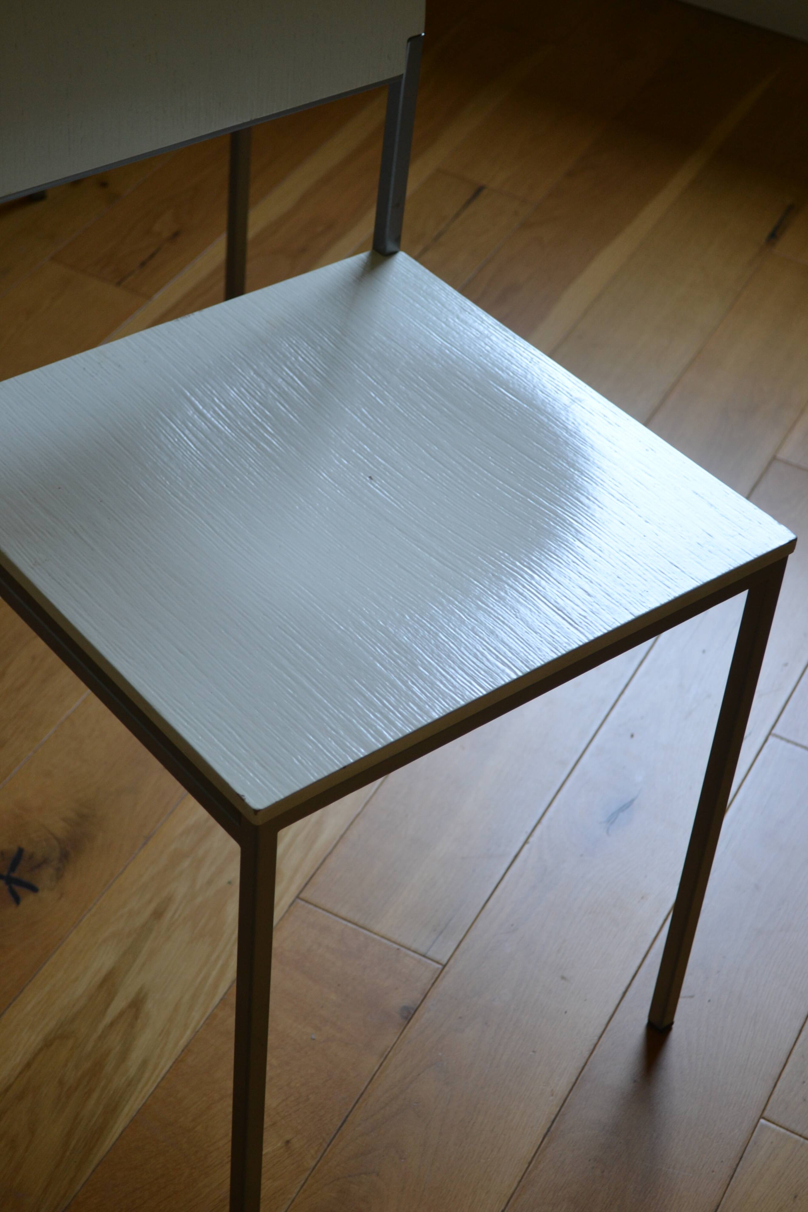 Set of 4 vintage metal and wood chairs from the 1990s.