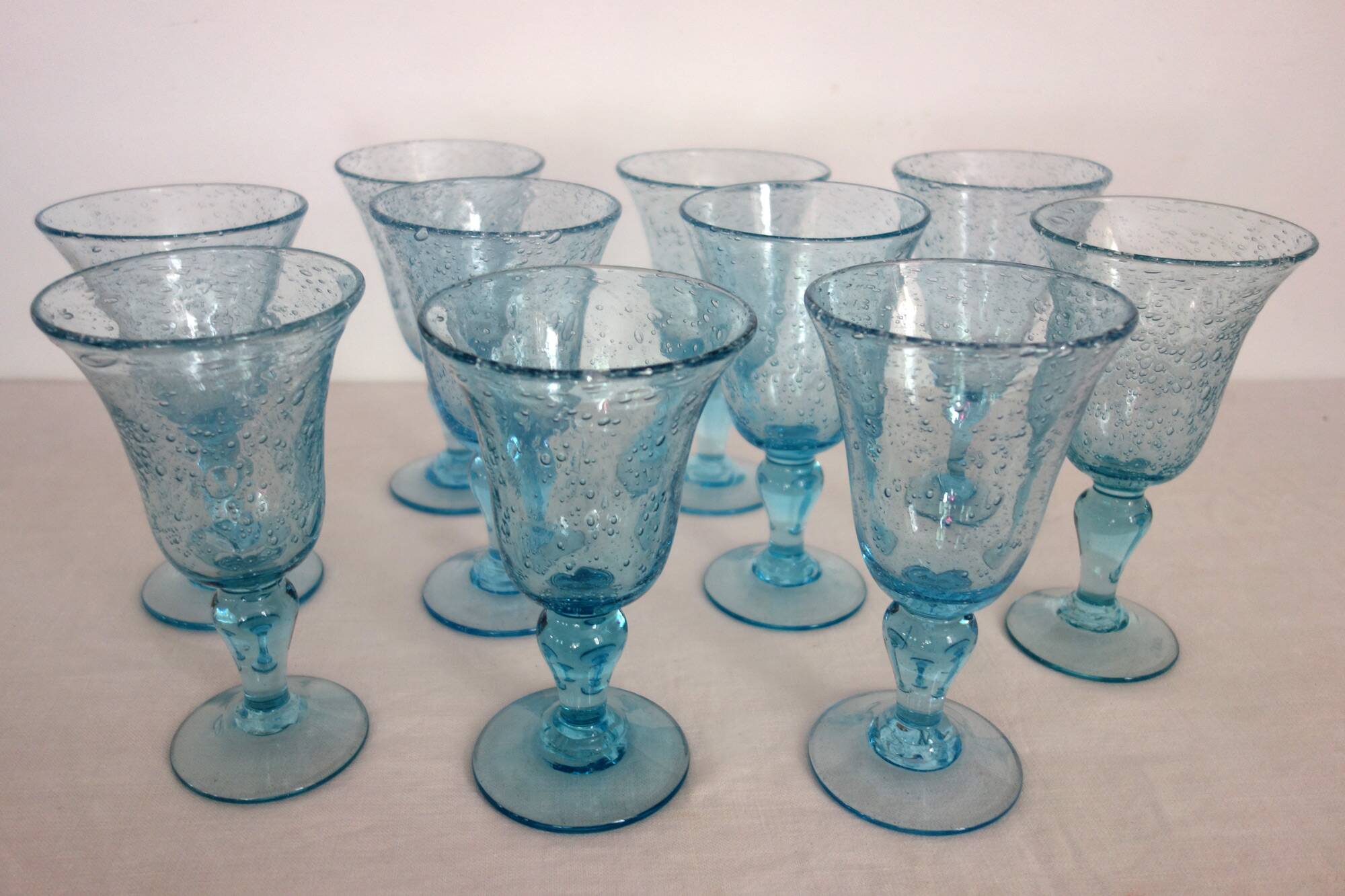 10 footed glasses from the biot glassworks in blown glass.