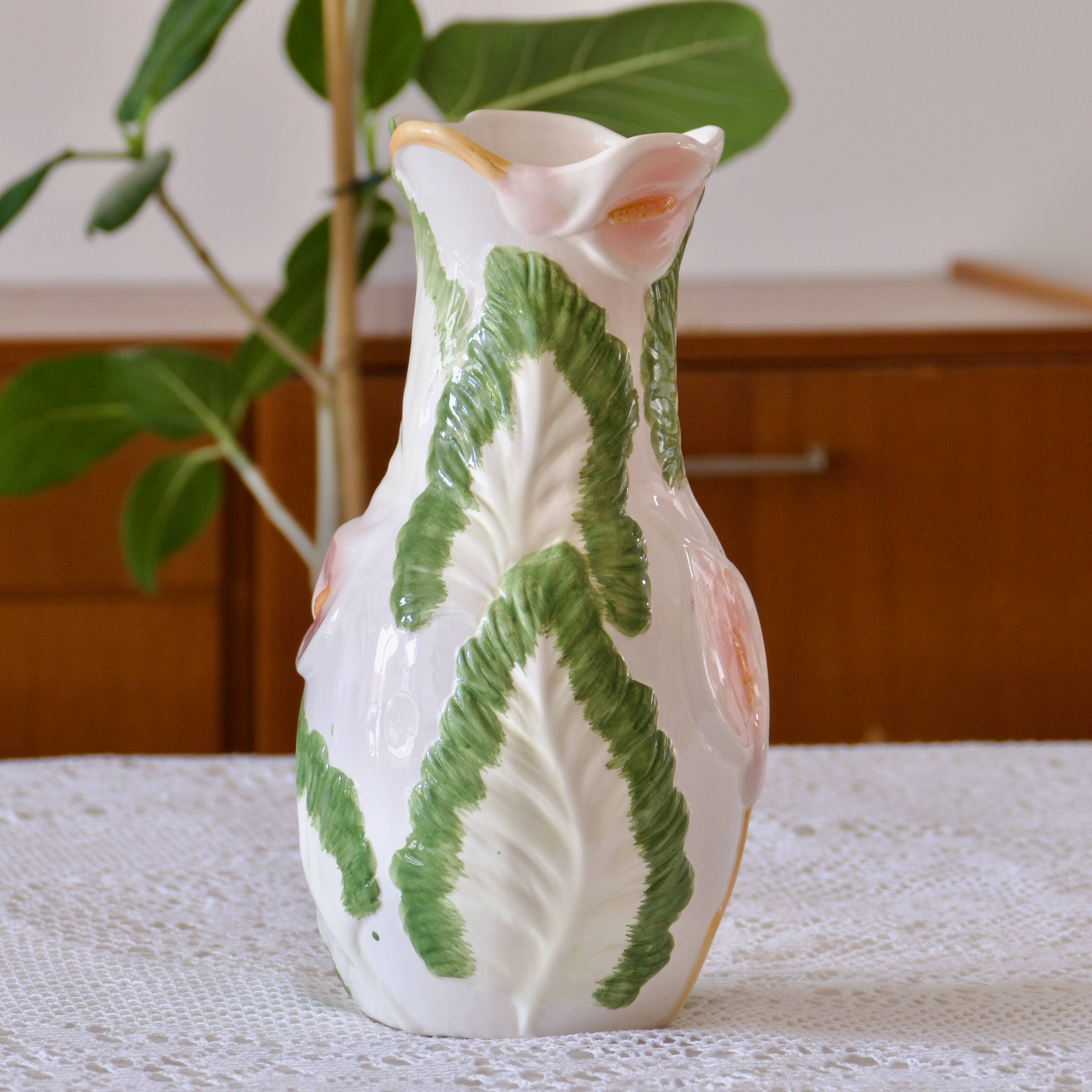 Large slip vase of Arum flowers