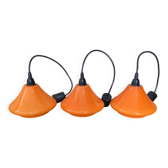 Set of three orange opaline suspensions from the 1970s Space Age.