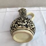 Former beige cracked ceramic pitcher