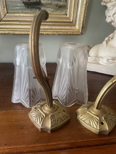 Pair of Art Deco wall sconces in frosted molded glass