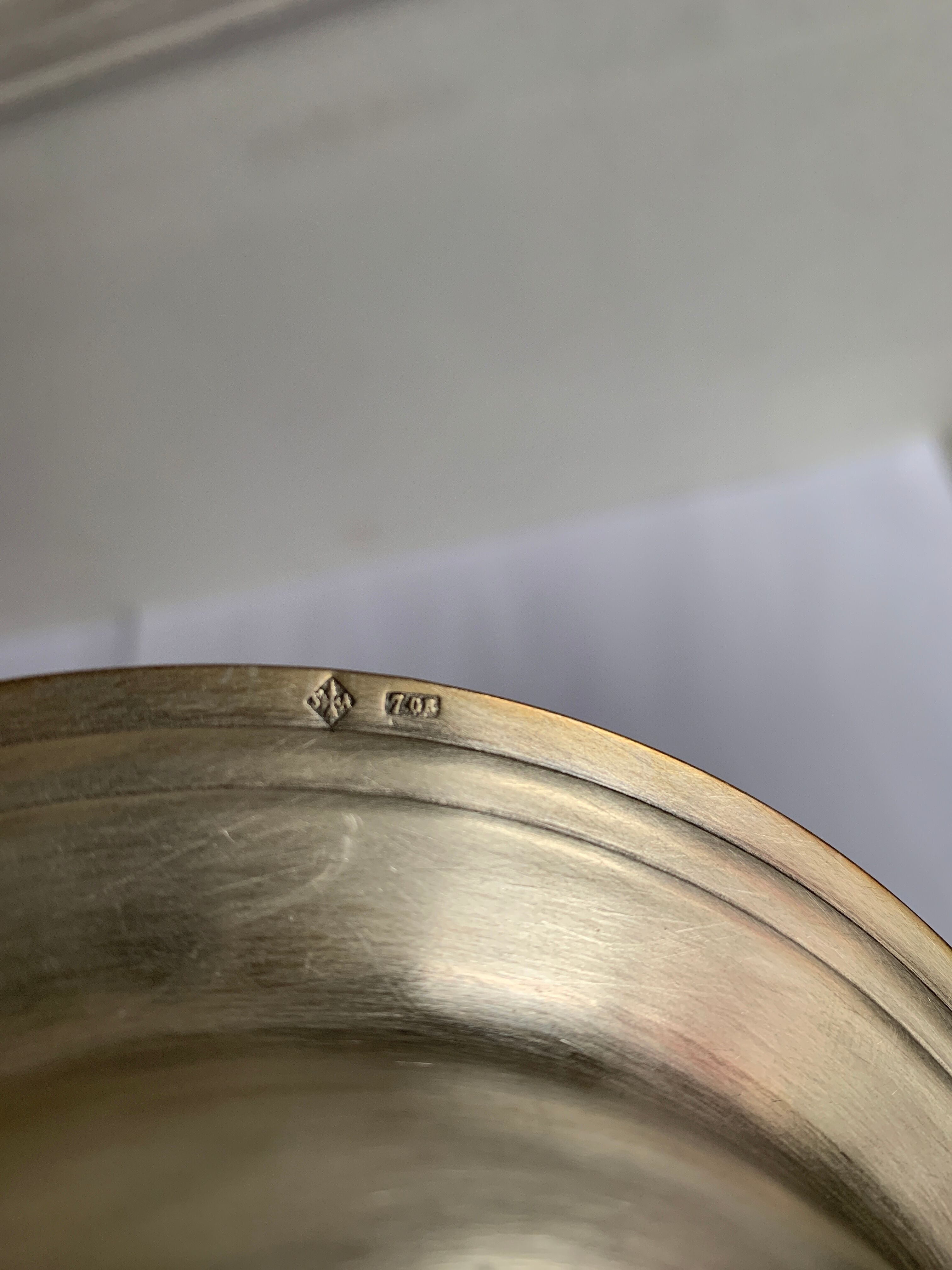 Empty brass pocket cup