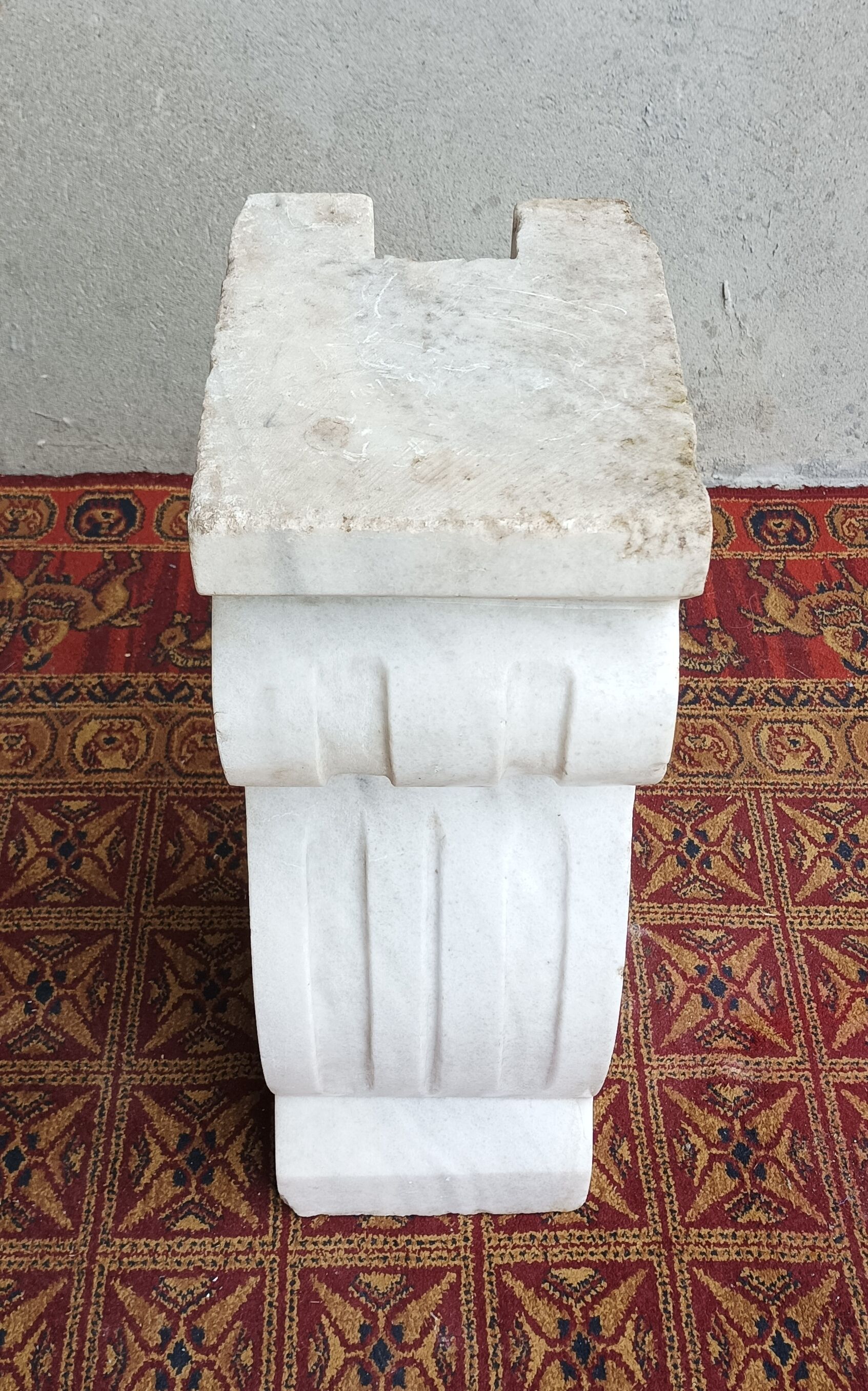 Sculpted Carrara marble stool column