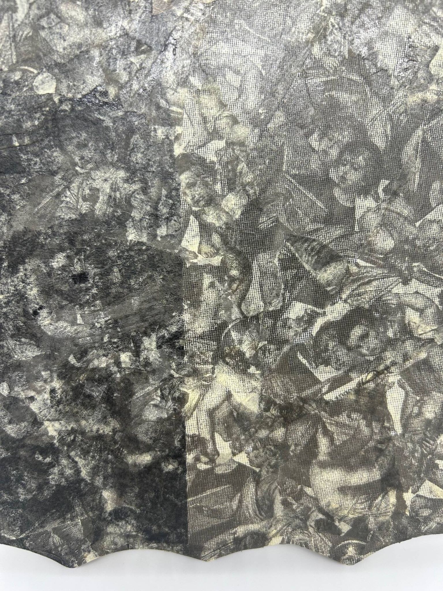 Free-form mirror decorated with cherubs.