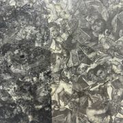 Free-form mirror decorated with cherubs.