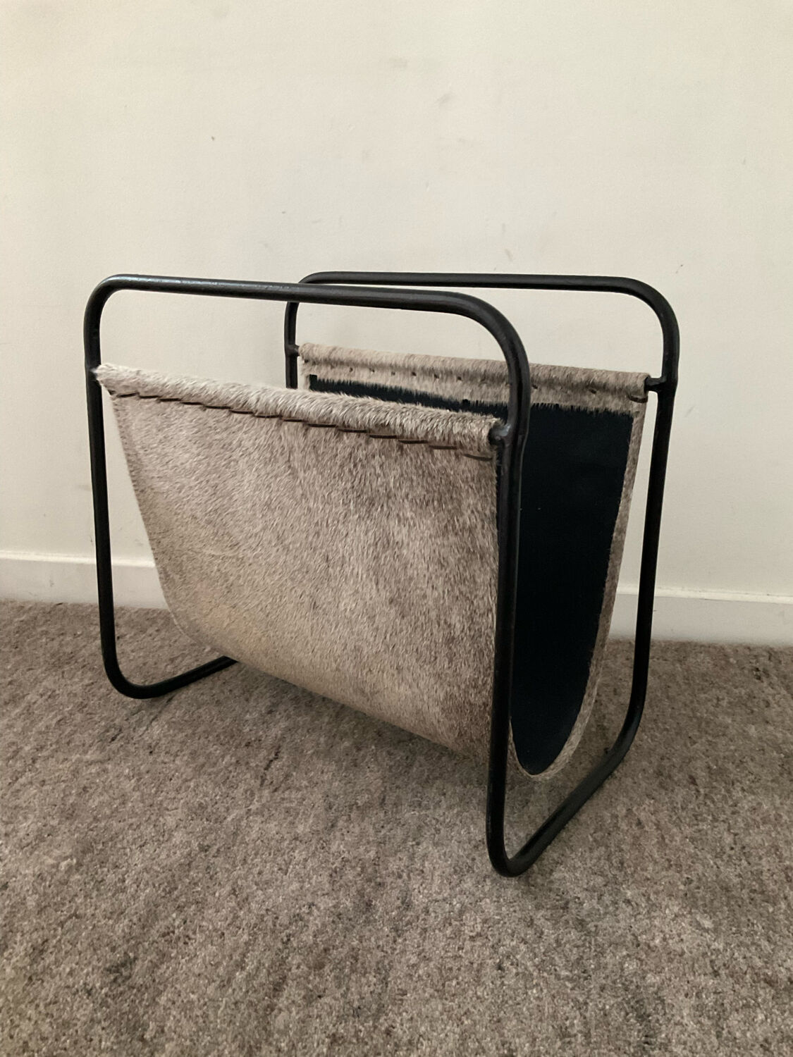 Vintage magazine holder in metal and leather