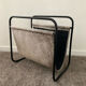 Vintage magazine holder in metal and leather