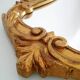 Baroque mirror gilded with gold leaf
