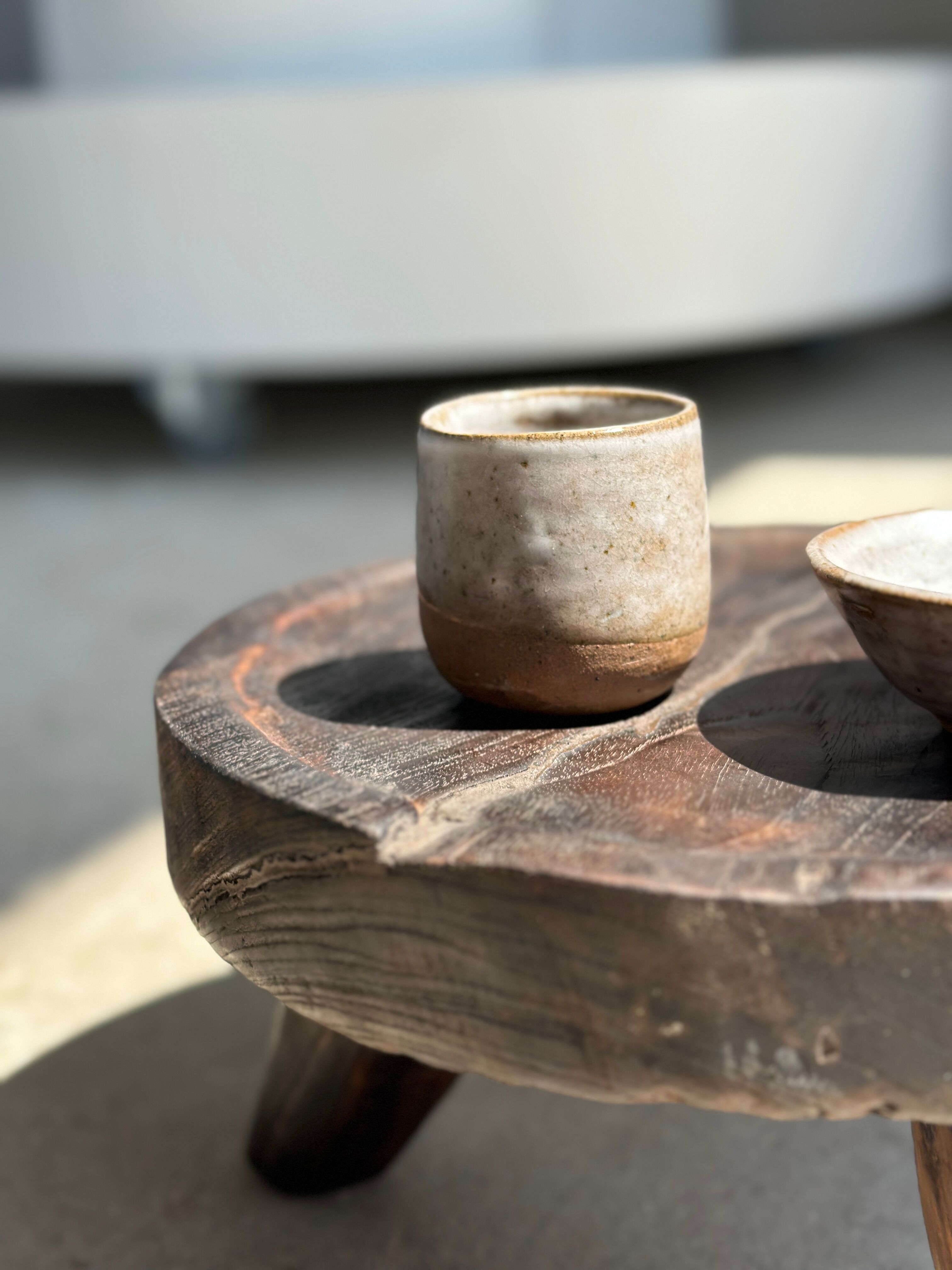 Small tripod stool low in dark brown upcycled teak