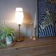 Mid-century gold metal table lamp with white striped shade