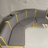 Yellow tubular modular bench & gray fabric