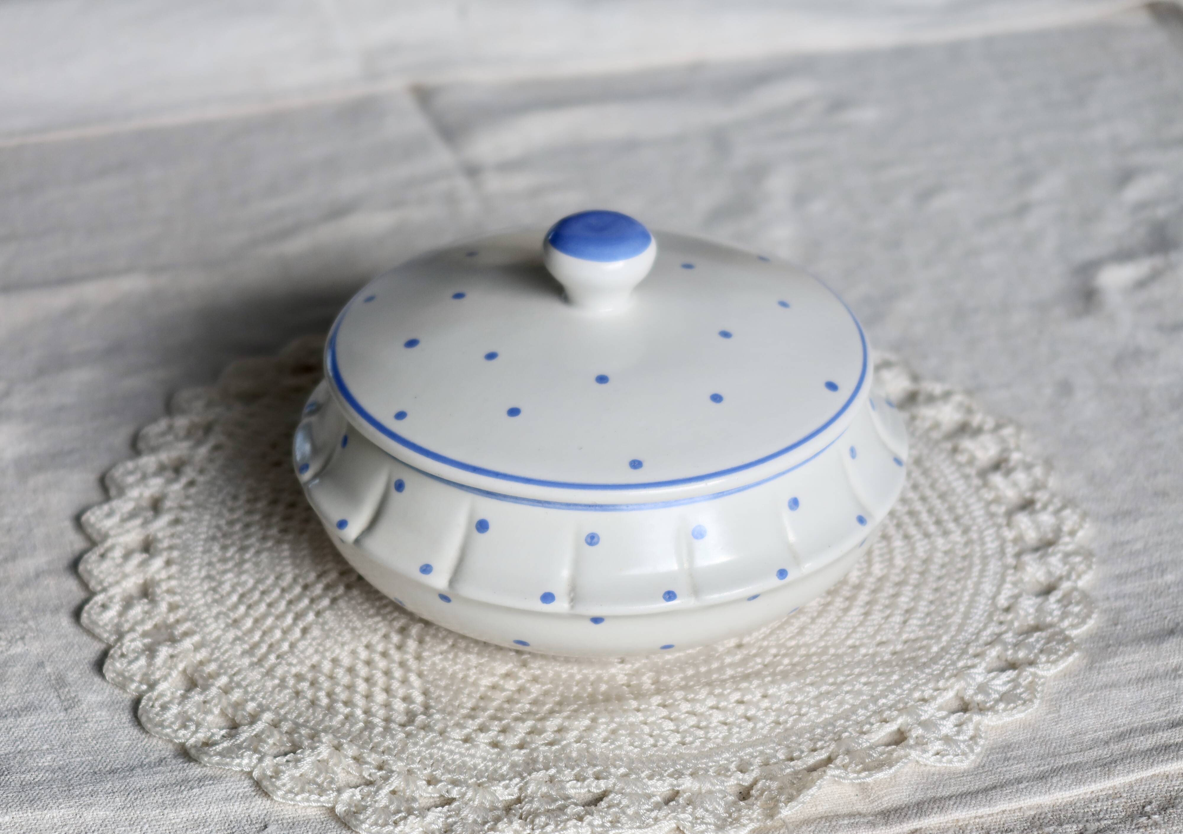 Vintage ivory earthenware candy box with blue polka dots