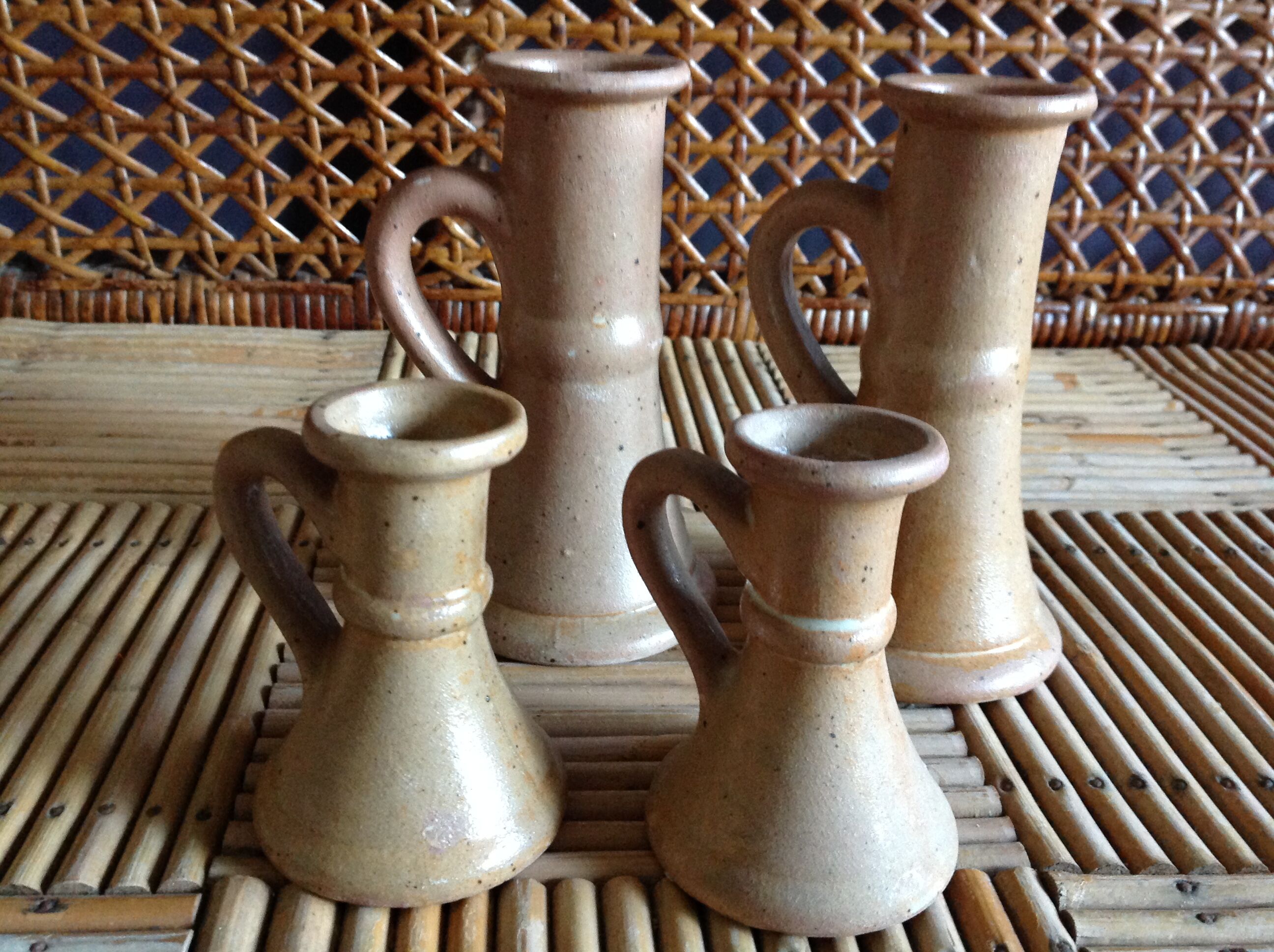 Set of 4 candlesticks in sandstone
