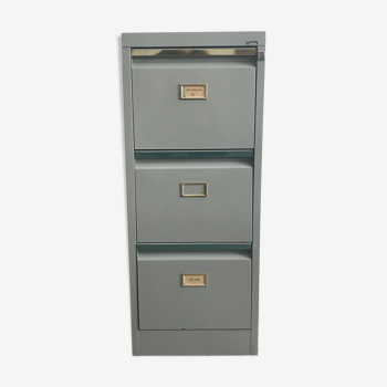 Three-drawer industrial grey metal filing cabinet with hanging backs