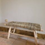 Eucalyptus wood bench and braided doum.