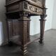 Renaissance-style cabinet in solid oak decorated with chimeras and caryatids