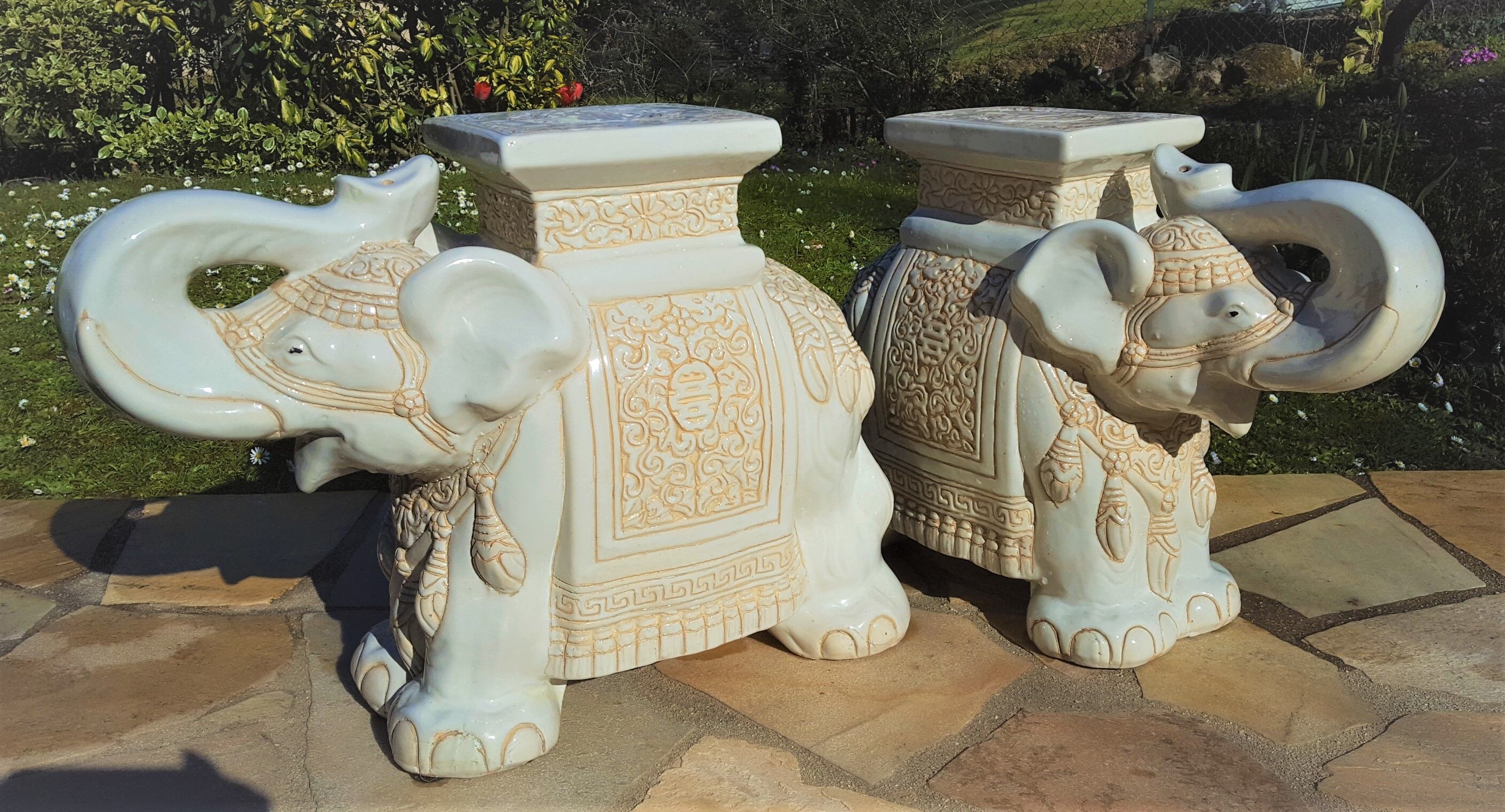Pair of enamelled white ceramic elephant harnesses