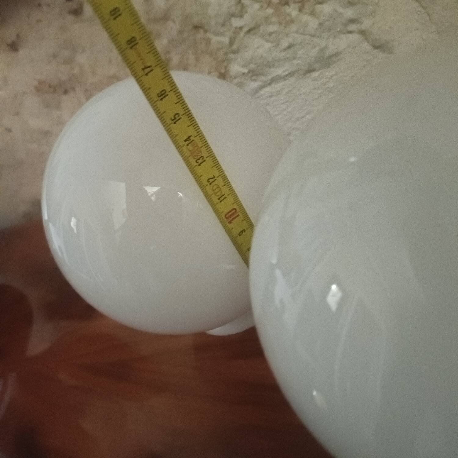 Pair of spherical lampshades in opaline.