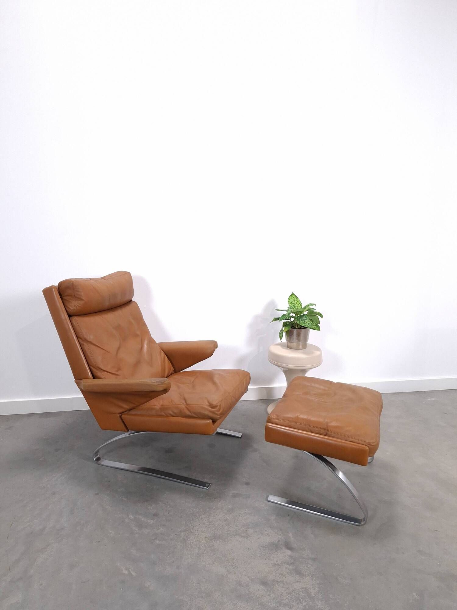 Vintage COR Swing armchair with ottoman, Reinhold Adolf, cognac leather