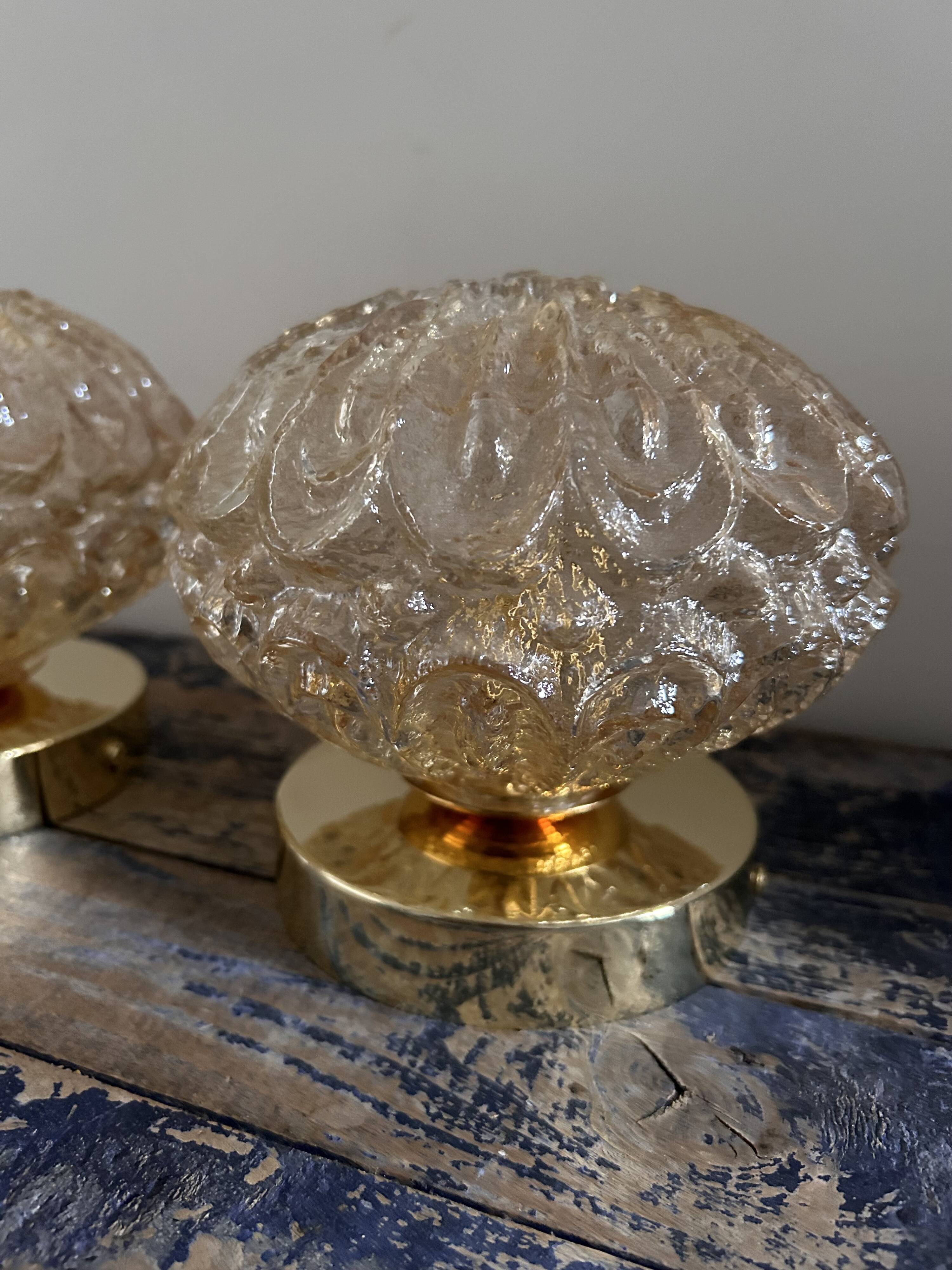 Set of two vintage amber glass wall lights