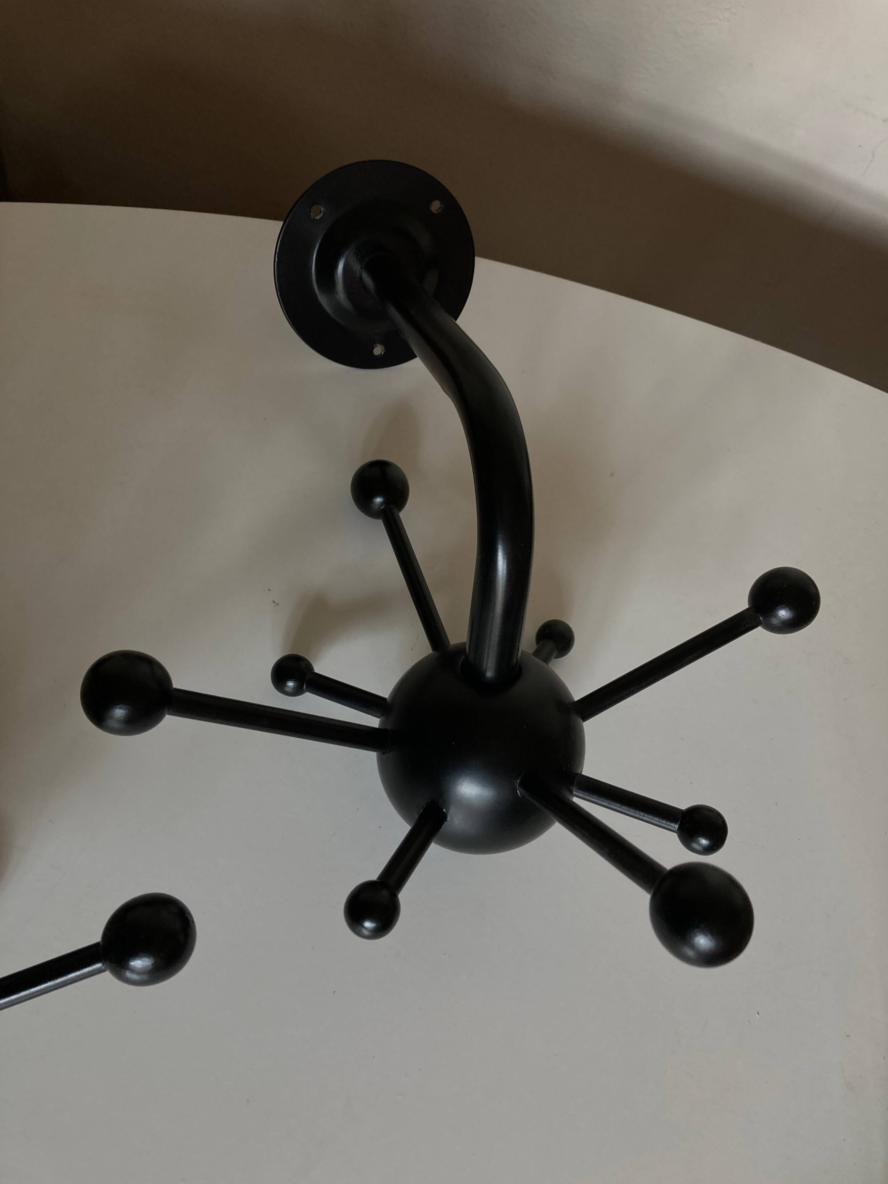 Pair of black space age sputnik coat racks