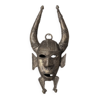 Handcrafted bronze wall mask, Sénoufo African art.