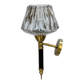 Vintage wall sconce torch in brass, thick glass globes.