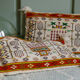 Coussin ancien broderies ethniques 51x34cm