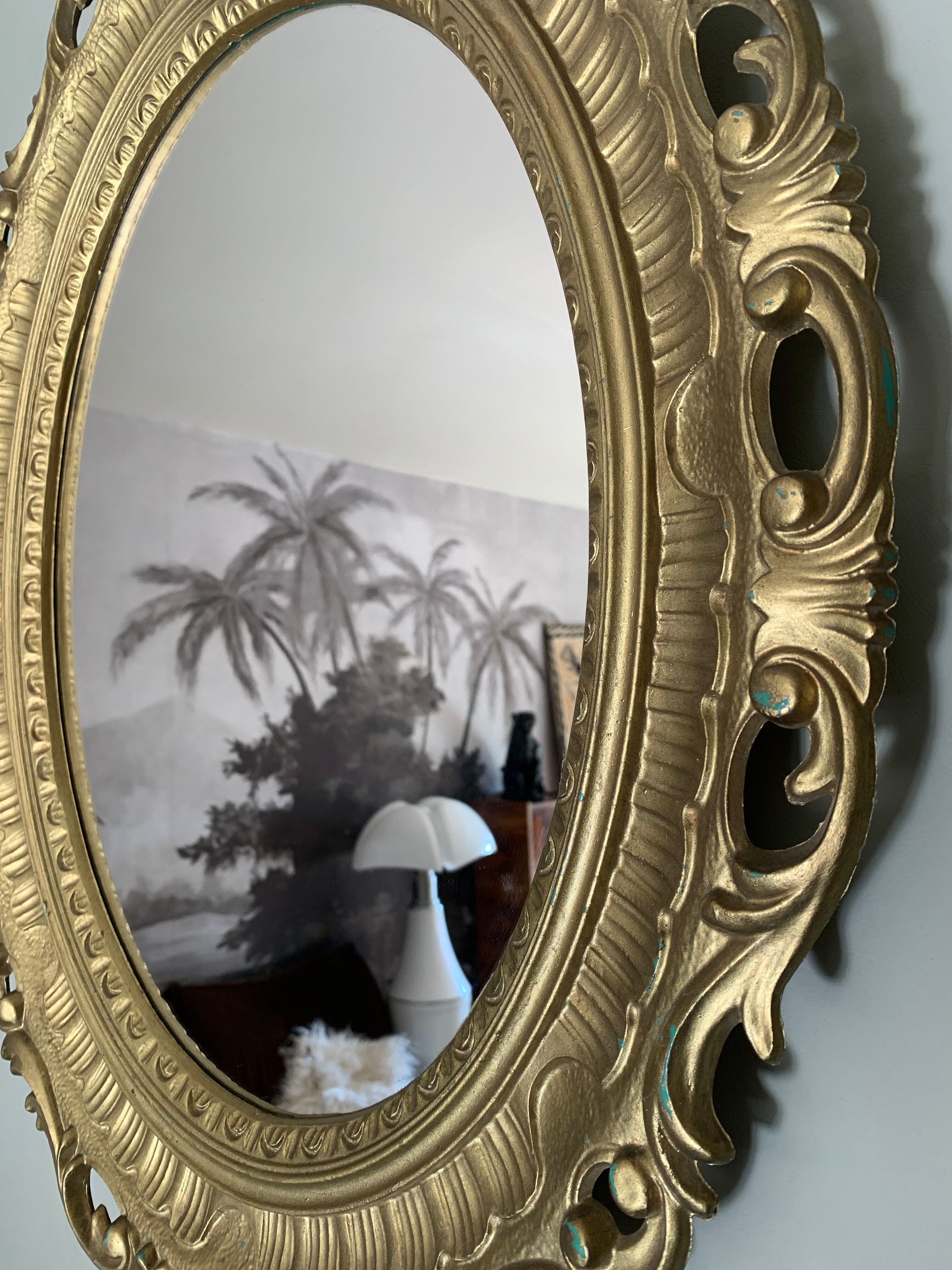 Miroir ovale doré années 70