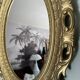 Golden oval mirror 70s