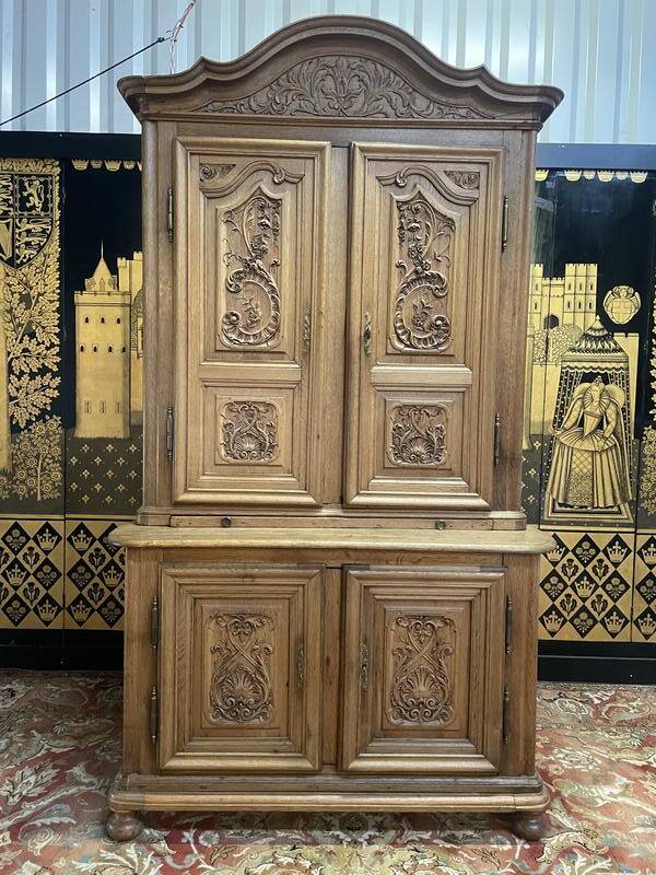 Two-body Renaissance carved oak sideboard