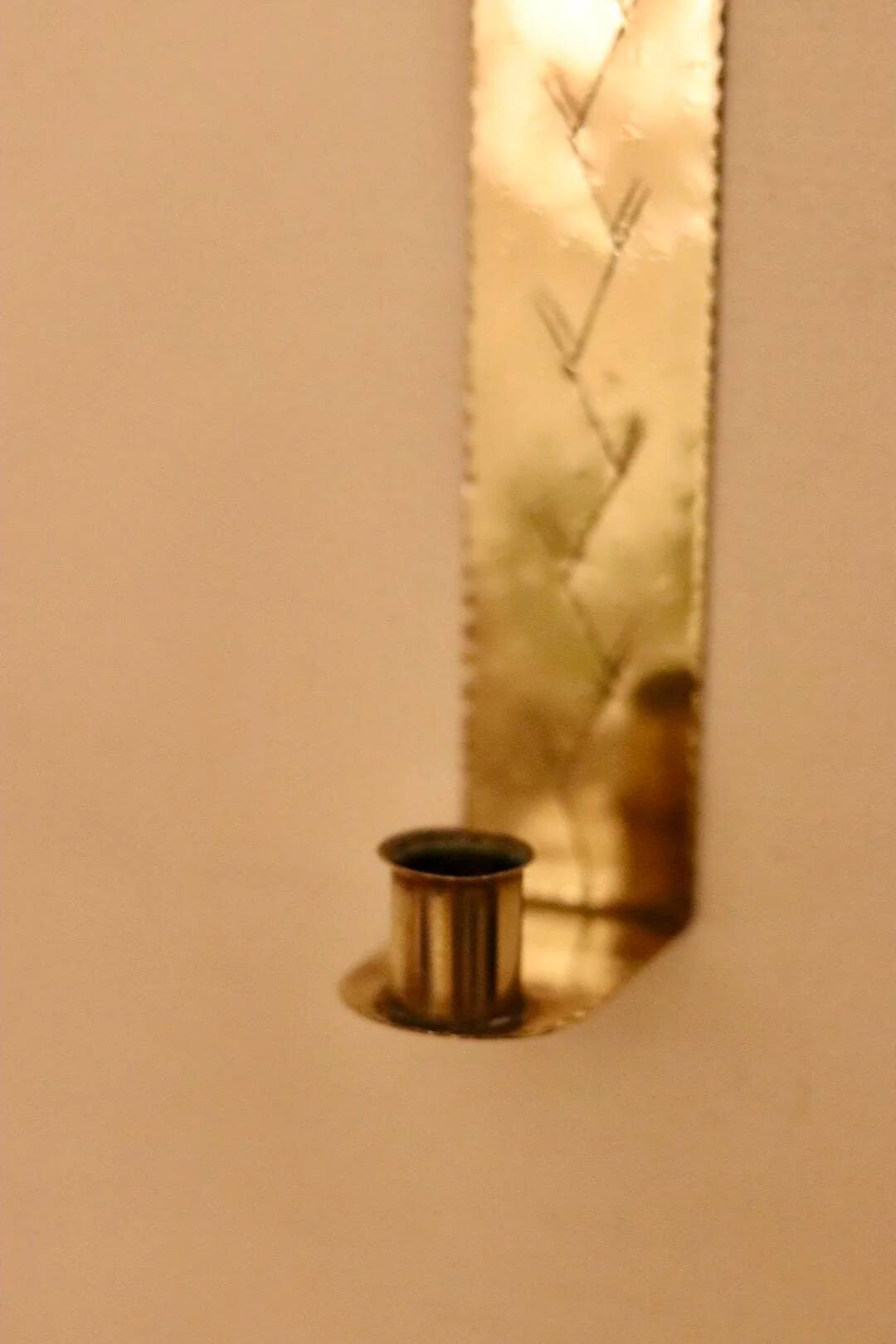 A pair of Swedish brass wall sconces from the mid-century.