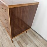 1950s chest of drawers covered in walnut with brass handles