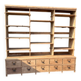 Large antique workshop furniture with drawers and shelves.