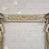 Neoclassical plaster fireplace with caryatids (nude women)