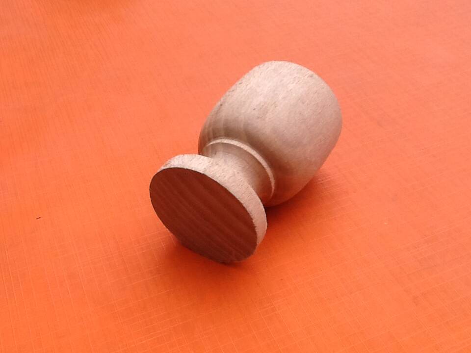 Two shells on foot shower turned wood raw finish