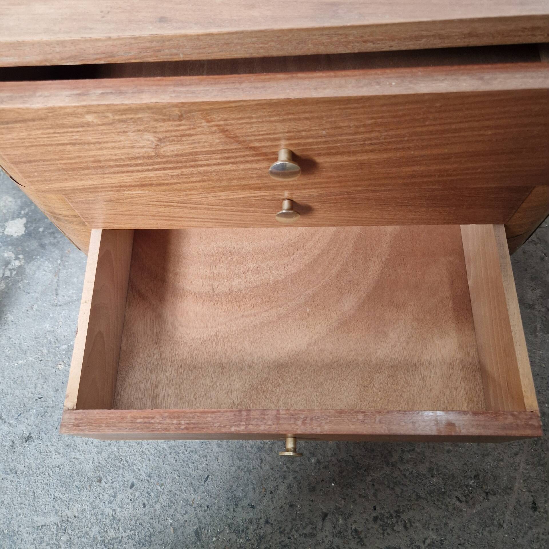 Small vintage Art Deco piece with 3 drawers, curved legs and caps.