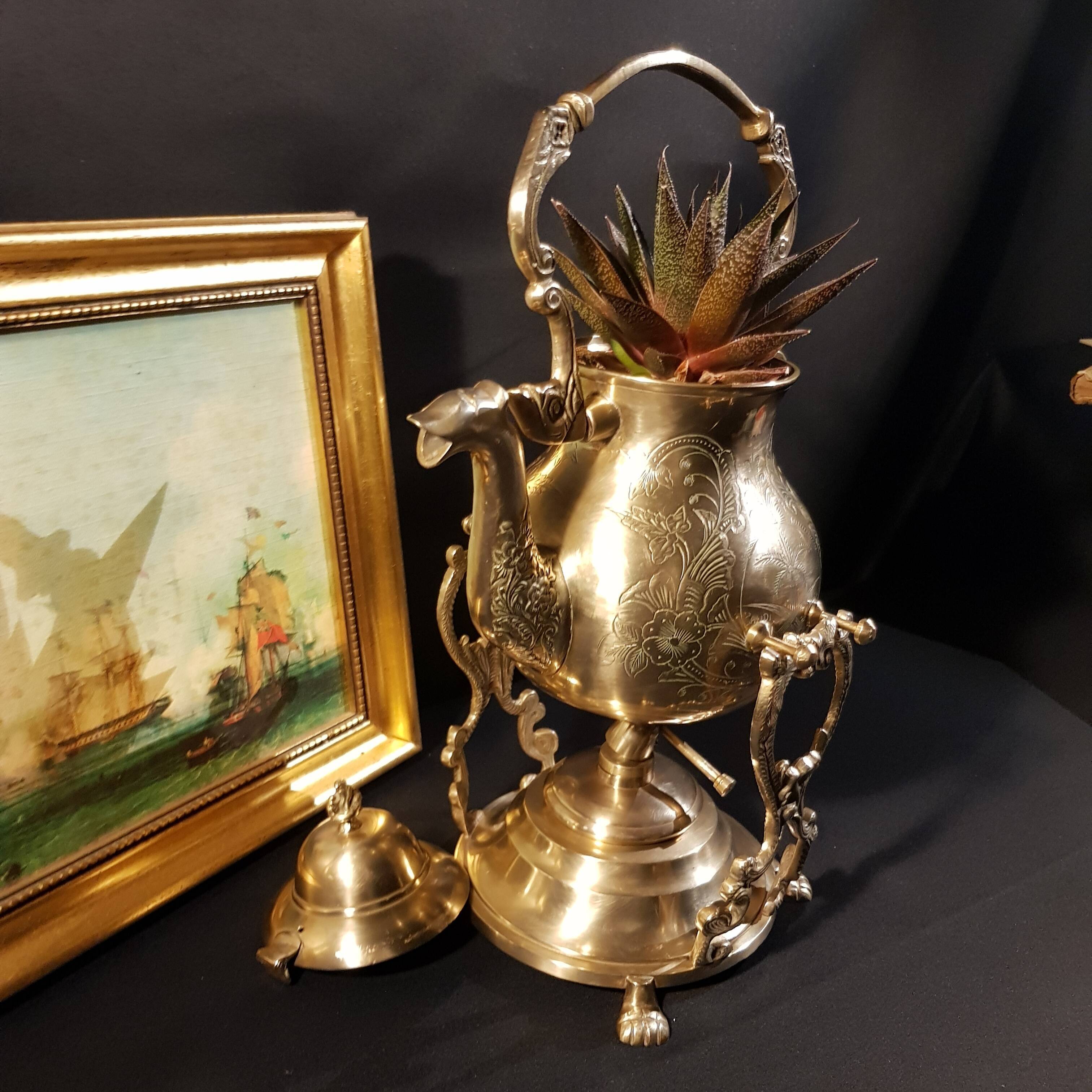 Oriental teapot on its support