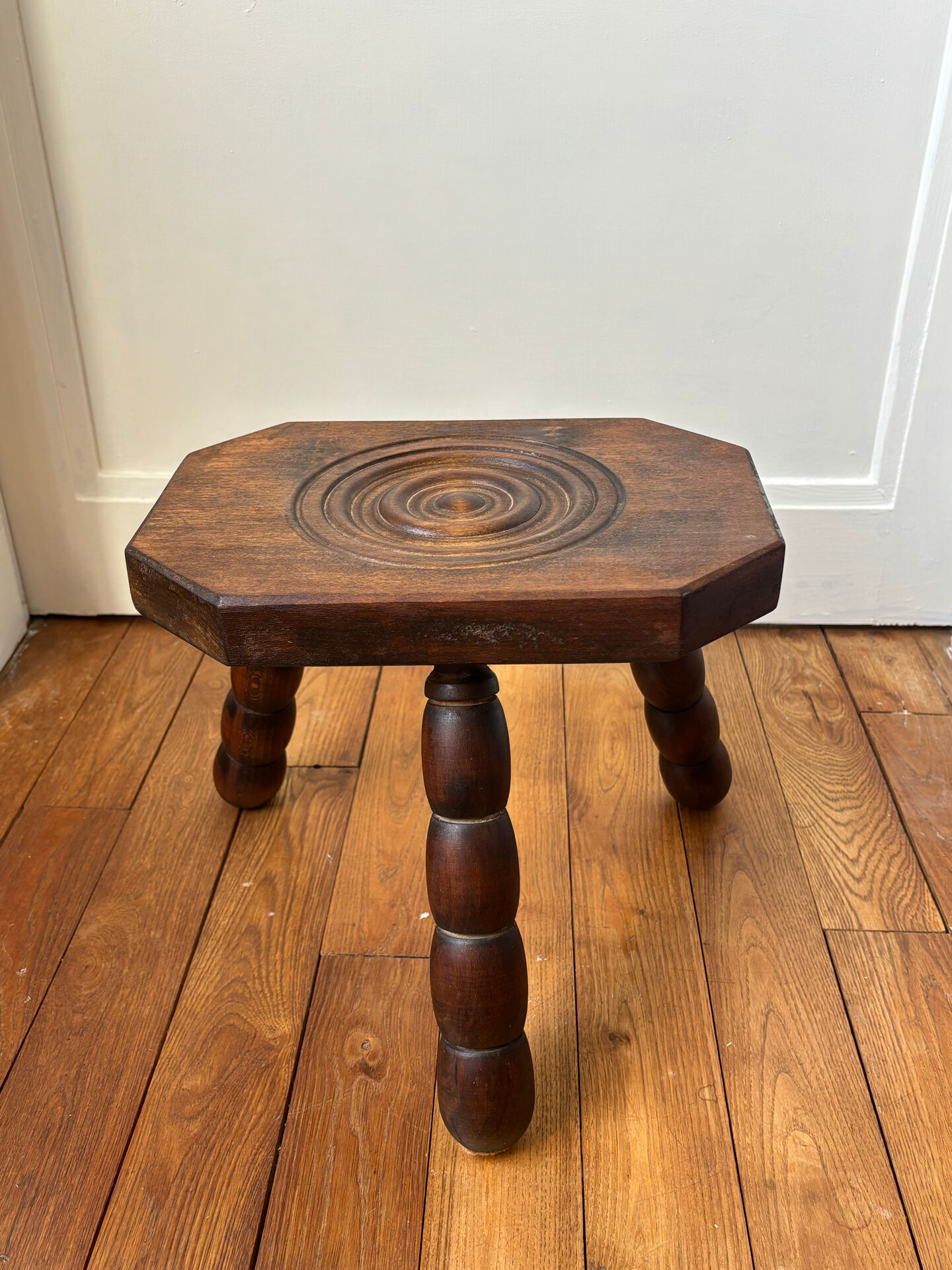 Wooden tripod stool