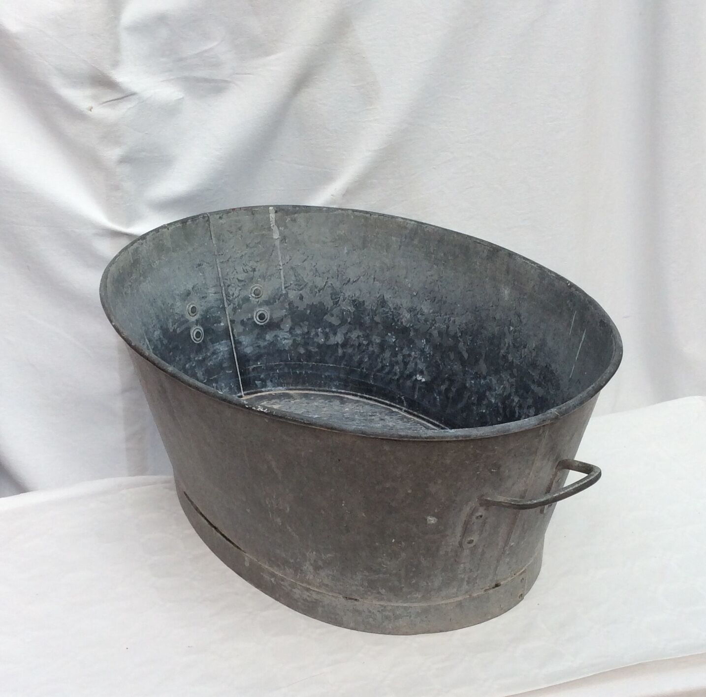 Old zinc basin oval shape with two handles