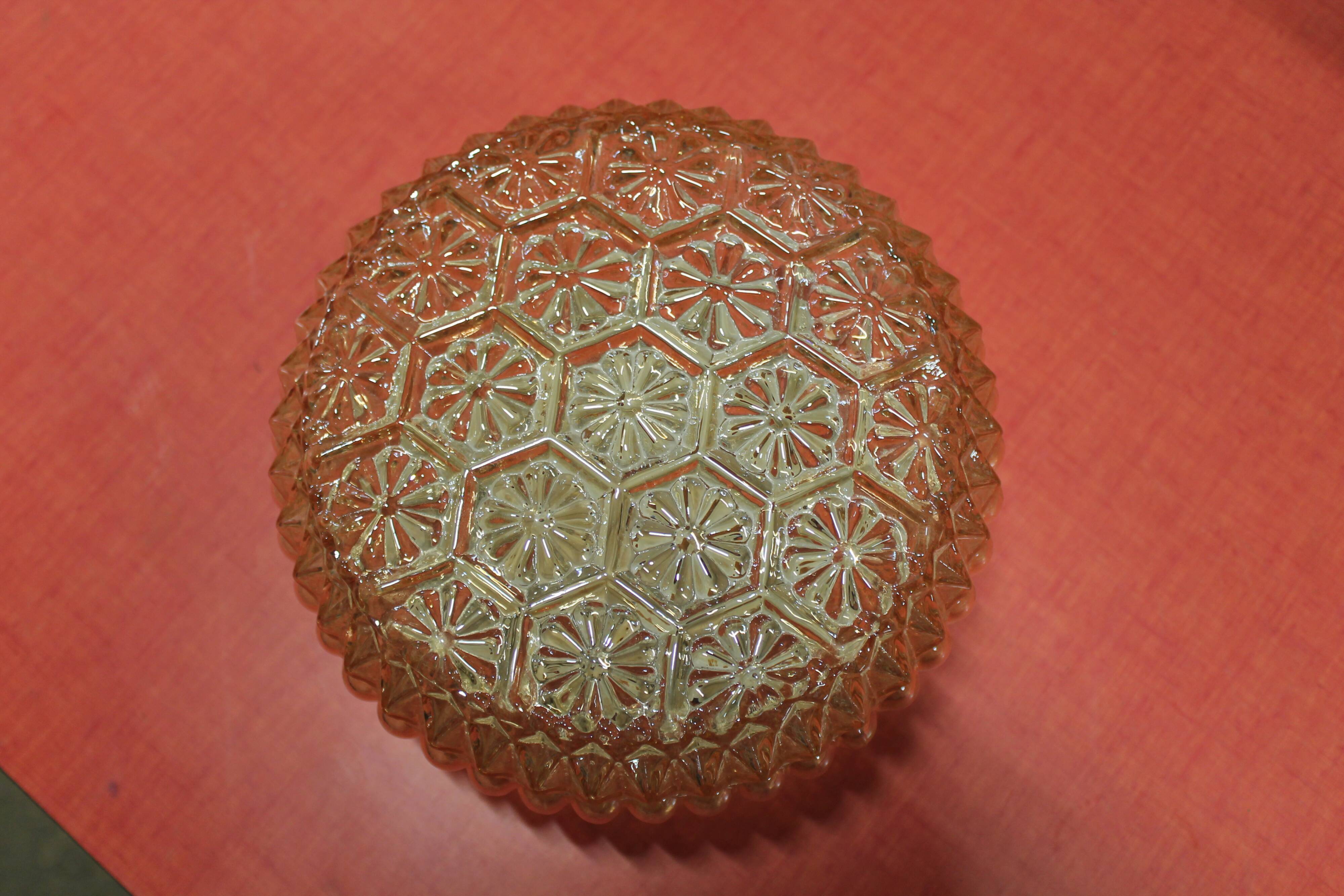 Moulded glass wall sconce