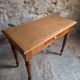 Vintage beech desk with a linoleum top and drawer.