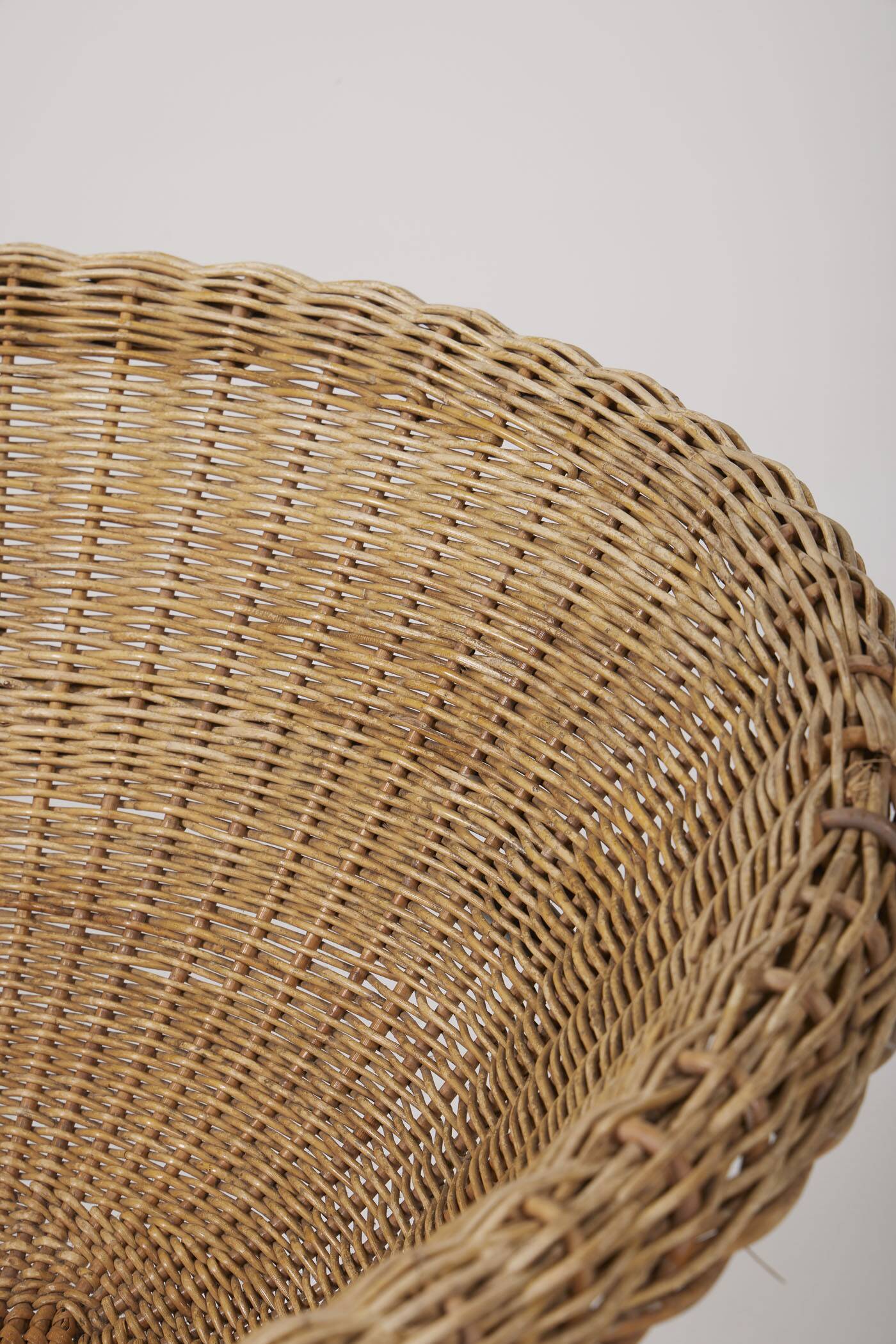 Arnold Bueno rattan and metal armchair by Mesquita