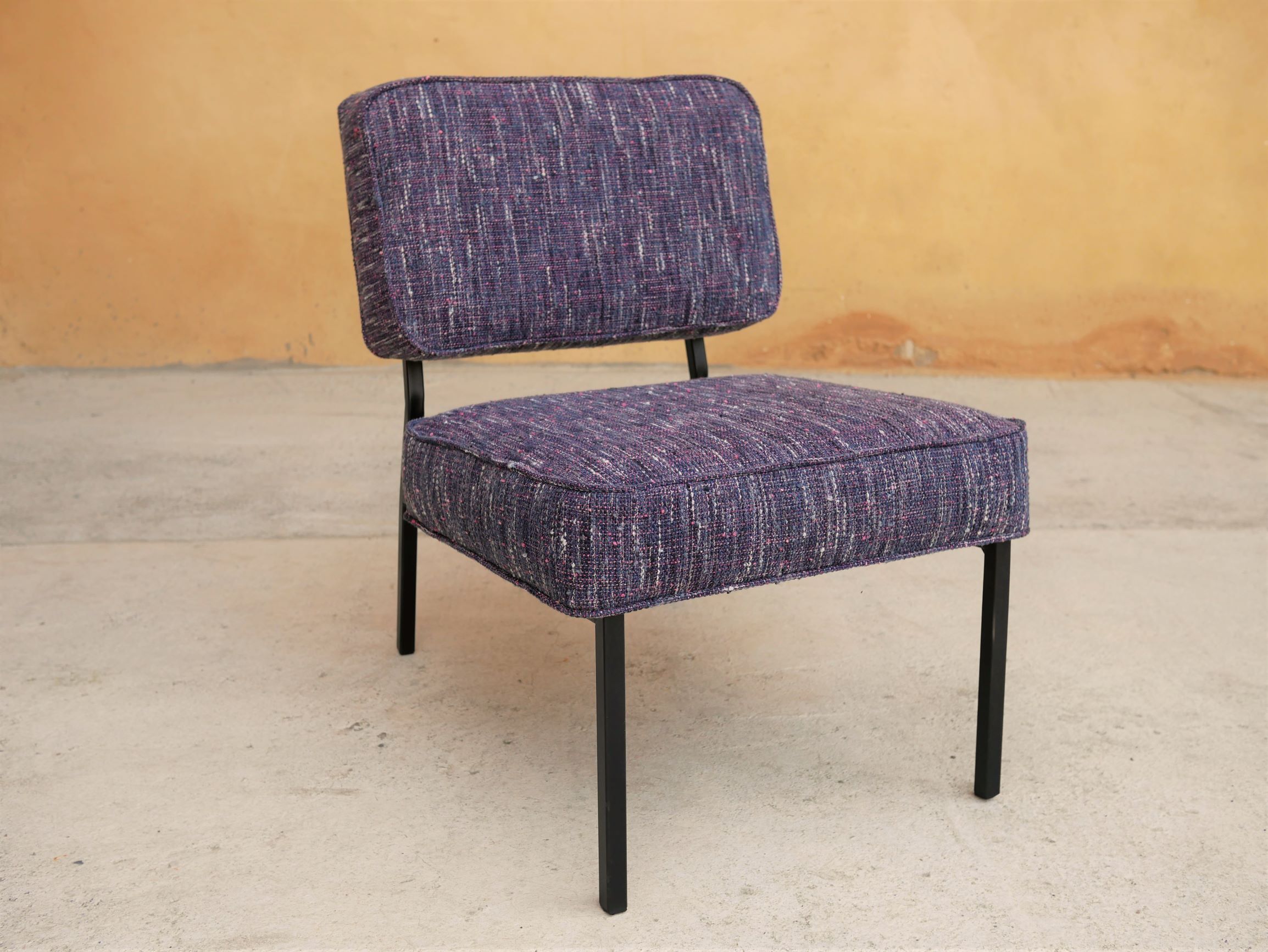 Vintage modernist metal foot armchair