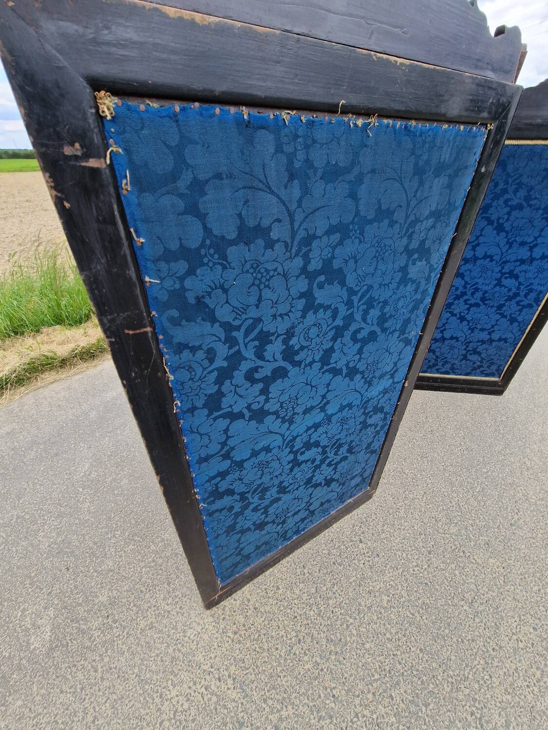 Folding screen in black-painted wood, 19th century