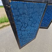 Folding screen in black-painted wood, 19th century