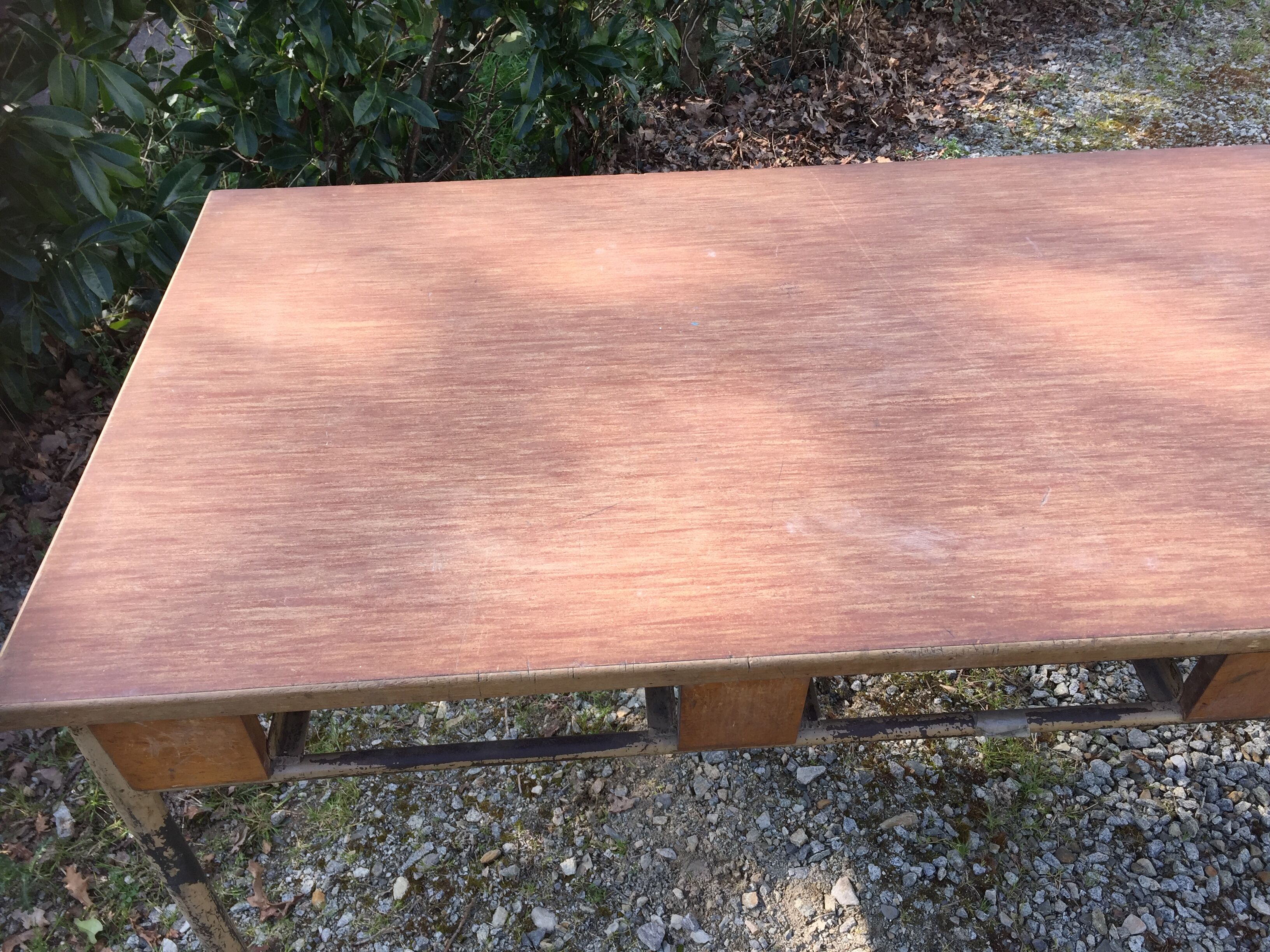 Vintage modernist table with metal tubular base